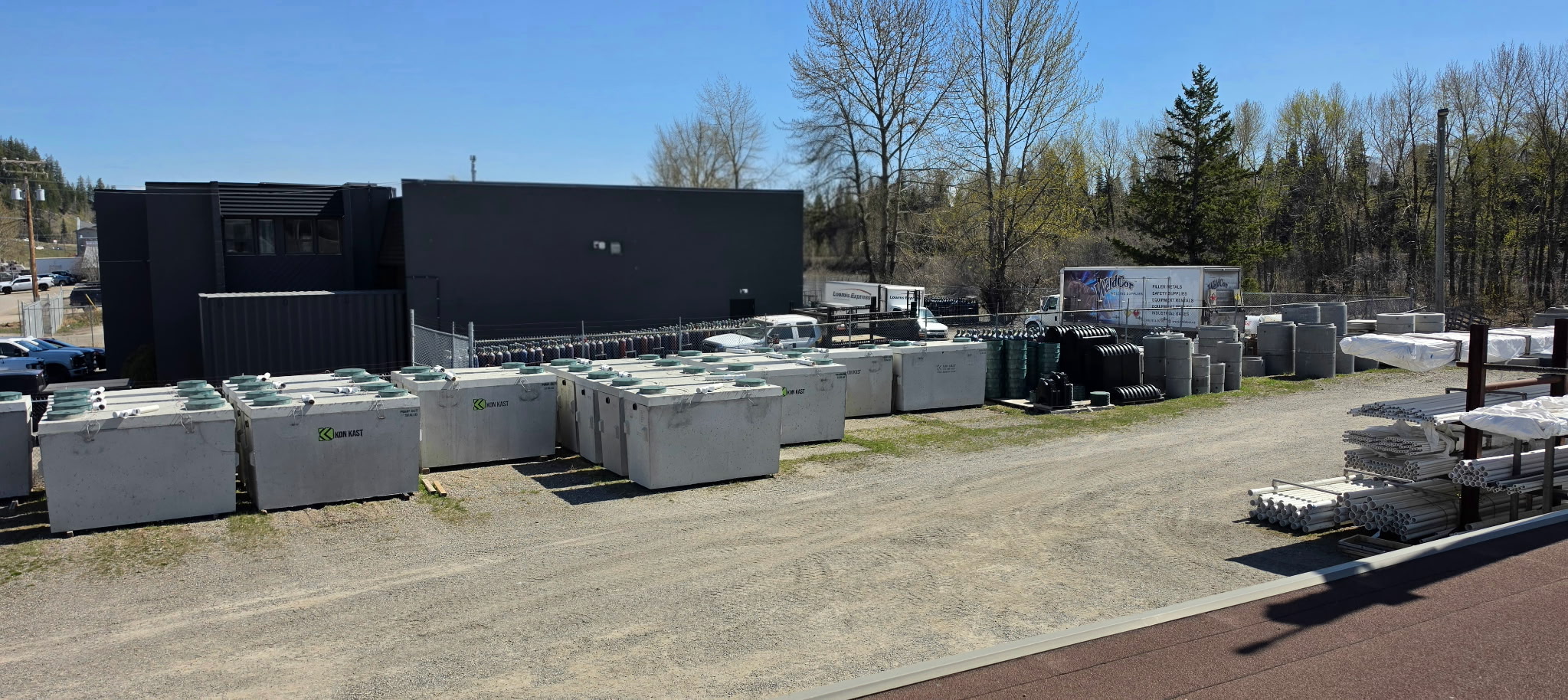 Concrete septic tanks and pipe at Pay-N-Save’s yard in Prince George